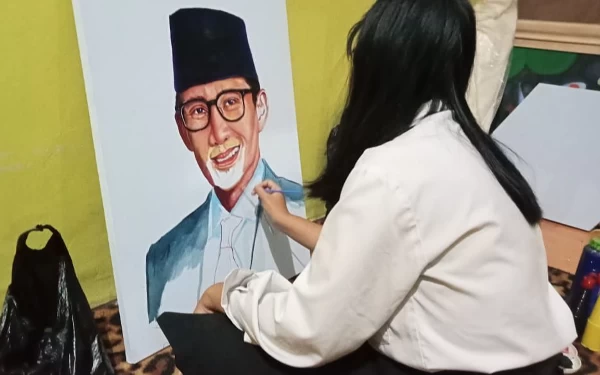 Thumbnail Berita - Lukis Wajah Sandiaga Uno, Mahasiswa UMM Pecahkan Rekor MURI